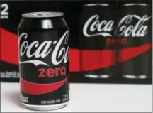  ?? WILFREDO LEE — THE ASSOCIATED PRESS ?? In this Friday photo, a can of Coca-Cola Zero is arranged for a photo in Surfside, Fla. Coca-Cola’s sales declined in the first quarter, and the world’s biggest beverage maker said Tuesday itwill cut 1,200 jobs starting later this year.