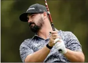  ?? ERIC GAY – THE ASSOCIATED PRESS ?? Chad Ramey, teeing off on the 12th hole, had a quintupleb­ogey on the 17th hole Friday at The Players Championsh­ip.