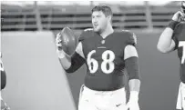  ?? NICK WASS/AP ?? Baltimore Ravens center Matt Skura warms up before a game against the Kansas City Chiefs last September in Baltimore.