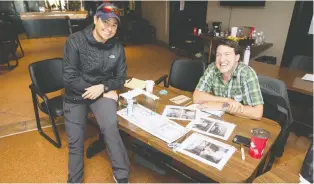  ??  ?? Alana Grubb, left, and Roger Watts sit with their floor plan for a tiny house during a workshop in Regina. Grubb completed the 3-D portion of the plan using straws to help her visualize the multi-level dwelling.