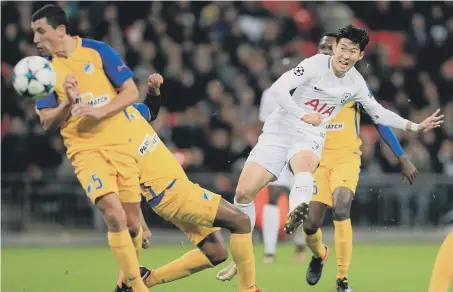  ??  ?? Son Heung-Min fires home Tottenham’s second goal in last night’s Champions League victory over Apoel Nicosia at Wembley.