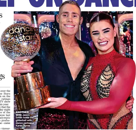  ?? ?? AnOTHer win: Jason Smith holds the glitterbal­l with dance partner Karen Byrne