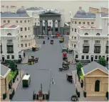  ?? ?? Left: The OO gauge model of the entrance to Euston station as it appeared in summer 1875, with the Doric Euston Arch that was demolished in 1962 and the pair of gatehouses that survive.
Right: A pair of LNWR trains have just arrived at Euston.