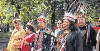  ??  ?? Stephen Augustine, centre, is shown with the Mi'kmaw chiefs of Nova Scotia on Treaty Day in 2018. Augustine is the first Indigenous person on the Nova Scotia Health Authority's board of directors.