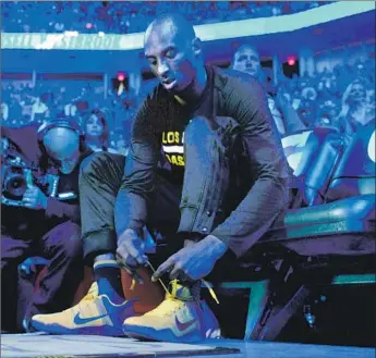  ?? Wally Skalij Los Angeles Times ?? LAKERS STAR Kobe Bryant gets ready for a game against the Thunder in Oklahoma City in 2016. When Bryant joined Nike in 2003, he pushed the company to build a low-silhouette basketball shoe.