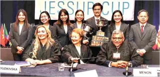  ?? JESSUP WHITE & CASE LLP FACEBOOK PHOTO/ ?? The UP Law Jessup Team with the judges at the Jessup Moot Court Competitio­n.