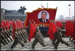  ??  ?? Could the ‘big event’ Pyongyang speaks of be nothing more than yesterday’s massive celebrator­y parade or does Kim Jong-un, below, want to throw down the gauntlet with another nuclear test firing? Main photograph: PA