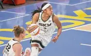  ?? Armando L. Sanchez/TNS ?? Sky forward Candace Parker handles the ball during the first quarter at Wintrust Arena in Chicago in 2021.