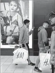  ?? Gary Coronado Los Angeles Times ?? BLACK FRIDAY is upon us, with these holiday shoppers looking for deals at the Glendale Galleria.