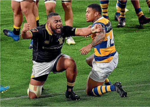  ?? PHOTO: PHOTOSPORT ?? This is what promotion means to the Wellington Lions, as Tolu Fahamokioa celebrates a try in front of Bay of Plenty’s Monty Ioane.
