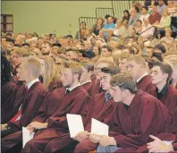  ??  ?? Colonel Gray high school graduates listen to the valedictor­ian speech during graduation exercises held at UPEI on June 26.