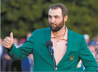  ?? AP-Yonhap ?? Scottie Scheffler speaks after winning the Masters golf tournament at Augusta National Golf Club in Augusta, Ga., Sunday.