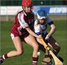  ??  ?? Sarah O’Connor (St. Martin’s) puts pressure on Aine Fanning.