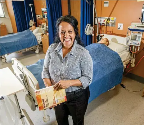  ?? Photo: Davd Martinelli ?? NAIDOC 2018: USQ Toowoomba nursing lecturer, researcher and author Raelene Ward embraces the theme ‘‘because of her, we can’’.