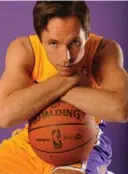  ?? ANDREW D. BERNSTEIN/GETTY IMAGES ?? Steve Nash gets used to new Lakers gear.