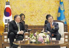  ?? Ahn Young-joon ?? The Associated Press South Korean President Moon Jae-in talks with U.S. Secretary of State Mike Pompeo during a meeting Sunday at the Blue House in Seoul, South Korea.