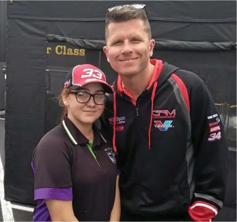  ?? Photo: Contribute­d ?? EXPERIENCE OF A LIFETIME: Wilsonton State High School Year 12 student Madi McDuff with V8 Supercars driver Garth Tander at the Ipswich Super Sprints.
