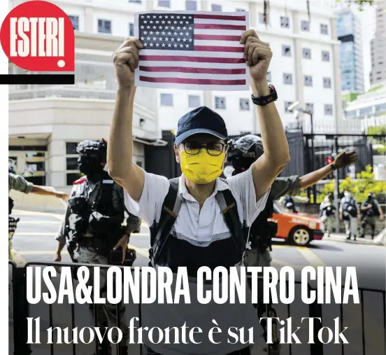  ?? FOTO ANSA ?? L’occhio comunista
Manifestaz­ioni contro Pechino al Consolato Usa ad Hong Kong