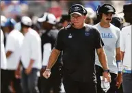  ?? Sean M. Haffey / Getty Images ?? UCLA coach Chip Kelly will face his former team when the ninth-ranked Bruins face No. 10 Oregon on Saturday.