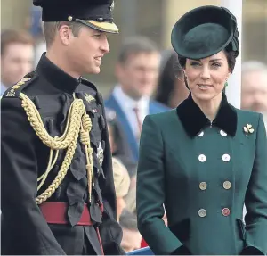  ?? Picture: Getty. ?? The duke and duchess honour the Irish Guards, which was the couple’s first public appearance since the duke’s skiing trip to Verbier.