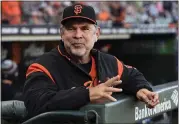  ?? JOSE CARLOS FAJARDO — STAFF ARCHIVES ?? San Francisco Giants manager Bruce Bochy stands in the dugout before a game at AT&amp;T Park in 2018.