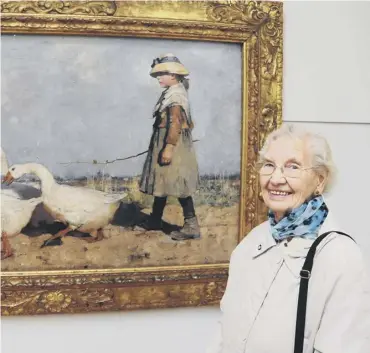  ??  ?? 0 Molly Forbes with James Guthrie’s To Pastures New, which inspired a portrait of her by Alicia Bruce