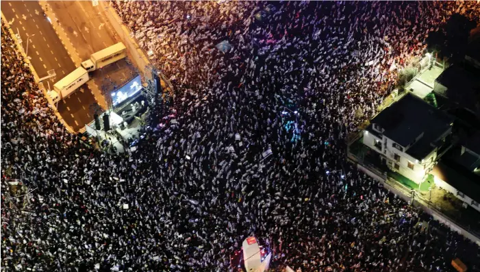  ?? AFP ?? About 200,000 people took to the streets in Tel Aviv on Saturday to oppose the reforms, with tens of thousands more across Israel joining protests in a ‘fight for democracy’