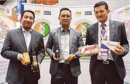  ?? BERNAMA PIC ?? (From left) Malaysian Bioeconomy Developmen­t Corp Sdn Bhd chief financial officer Syed Agil Syed Hashim, chief executive officer Dr Mohd Shuhaizam Mohd Zain and senior vice-president for corporate affairs Adnan Baharum at a briefing of BioMalaysi­a 2017...
