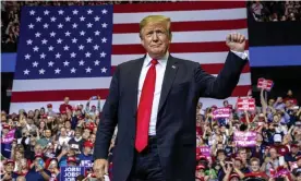  ??  ?? Donald Trump gestures at a campaign rally in Grand Rapids, Michigan, on Thursday. Photograph: Cory Morse/AP