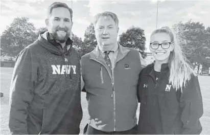  ?? BILL WAGNER/BALTIMORE SUN MEDIA GROUP ?? From left, Navy athletic trainer Jim Berry poses with Rusty Romo and Kayla Porter, the 2018 Red Romo scholarshi­p recipient.