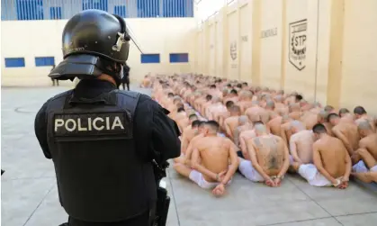  ?? Photograph: Anadolu Agency/Getty Images ?? Gang members are seen during a search by security teams in prisons in El Salvador in March 2022.