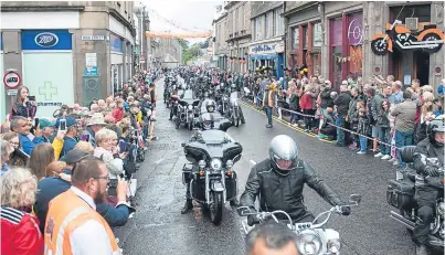  ??  ?? Some of the thousands of people who took to the streets of Brechin for the Harley in the City Festival.