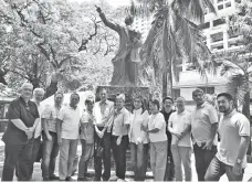  ?? ?? SAMAHANG PLARIDEL NEW OFFICERS. New members of the Board of Trustees of the Associatio­n of Philippine Journalist­s Samahang Plaridel Foundation Inc. assemble at the monument of Marcelo H. del Pilar located at the corner of Quirino Avenue and MH del Pilar St. in Manila after being elected during the first post-pandemic general membership meeting at Aloha Hotel. Shown are (from left) Vice President Andy Sevilla, Board Secretary Atty. Hector Villacorta, PRO Joey de Guzman, Monch Henares, Treasurer Jinky Jorgio, former President and now Chairman Emeritus Rolly Estabillo, PRO Weng Ocfemia, new President Evelyn Quiroz, Auditor Twinkle Valdez, Vito Barcelo, Raymond Burgos, Ed Adaya and Milo Rivera. Not in photo are Klink Ang, Ron de los Reyes and Marc Anthony Reyes.