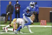  ?? LON HORWEDEL — THE ASSOCIATED PRESS ?? Detroit Lions running back D’Andre Swift (32) runs for a 43-yard touchdown reception against the San Francisco 49ers in the second half Sunday in Detroit.