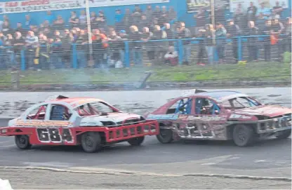  ??  ?? The Scottish Championsh­ip event involves stock cars racing around the oval track at Cowdenbeat­h Racewall, providing plenty of spills and thrills for the crowd.
