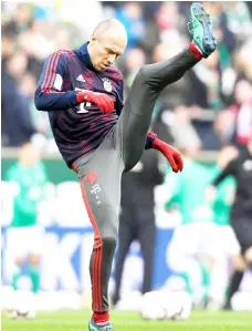  ??  ?? Arjen Robben during the warm up before german Bundesliga match. — Reuters