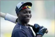  ?? JEFF HAYNES — THE ASSOCIATED PRESS FILE PHOTO ?? New York Yankees’ Didi Gregorius smiles during batting practice before a baseball game against the Chicago White Sox in Chicago. A franchise known for the Babe, the Boss and the Iron Horse has a new set of nicknames. Clown face (Brett Gardner) is in...