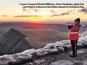  ??  ?? &gt; Lance Corporal Derek Williams, from Cwmbran, plays the Last Post in tribute to the fallen ahead of Armistice Day