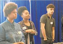  ?? LISA VERNON SPARKS/STAFF ?? Nayelis Hill, from left, Yanitza DeJesus and Dylan Varney, and other high schoolers around the Peninsula participat­e in an inclusion workshop, “Diversity Dialogue Day,” at Hampton University Tuesday.