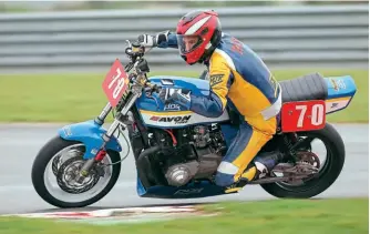  ??  ?? Right: Defying the greasy conditions, Rob Wittey lets it all hang out on his beautifull­y prepared Kawasaki GPZ 1170 P/C Superbike 2. The Engineer from Aylesbury stormed to three Superbike victories and was also the first four-stroke and fourth overall in the Classic Race of Aces.