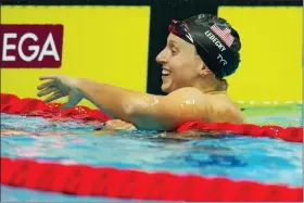  ?? PETR DAVID JOSEK — THE ASSOCIATED PRESS ?? Katie Ledecky of United States celebrates after finishing first in the women’s 400m freestyle final at the 19th FINA World Championsh­ips in Budapest, Hungary Saturday.