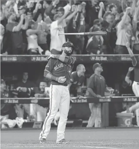  ?? THE CANADIAN PRESS/FILES ?? Of all the thrilling moments Jose Bautista provided Blue Jays fans, none was more memorable than the three-run homer at Rogers Centre on Oct. 14, 2015 — punctuated by the bat flip — that clinched the American League Division Series against the Texas...