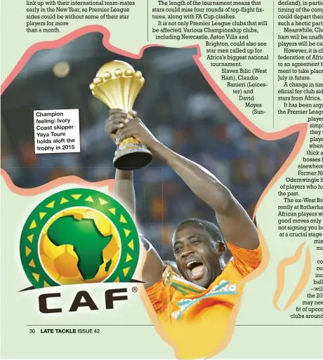  ??  ?? Champion feeling: Ivory Coast skipper Yaya Toure holds aloft the trophy in 2015
