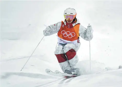  ?? LOIC VENANCE AGENCE FRANCE-PRESSE Mikaël Kingsbury a démontré toute sa maîtrise de sa discipline dans la dernière descente lundi pour remporter sa première médaille d’or olympique. ??