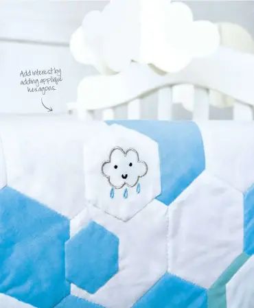  ??  ?? Add interest by adding appliqué
hexagons.
We don't mind rain clouds when they're as sweet as these little guys!
