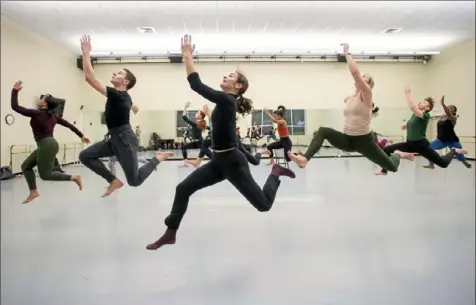  ?? Steph Chambers/Post-Gazette photos ?? Senior Jane Zogbi, center, rehearses with other members of the Point Park University Conservato­ry Dance Company.