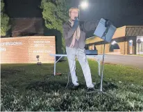  ?? TED SLOWIK/DAILY SOUTHTOWN ?? Richard Mantoan, of Chicago Height, speaks during a prayer vigil Wednesday night outside a dental office next to a Planned Parenthood facility in Flossmoor.