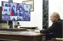  ?? MIKHAIL METZEL / SPUTNIK / KREMLIN POOL PHOTO VIA AP ?? Russian President Vladimir Putin chairs a meeting to discuss measures in response to the terrorist attacks at the Crocus City Hall concert venue, via a video conference at the Novo-Ogaryovo state residence, outside Moscow, Russia, on Monday.