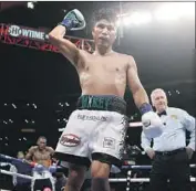  ?? Alex Gallardo Associated Press ?? MIKEY GARCIA will put his unbeaten record on the line Saturday night against Errol Spence Jr.