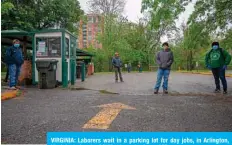  ??  ?? VIRGINIA: Laborers wait in a parking lot for day jobs, in Arlington, Virginia during the COVID-19 pandemic. — AFP